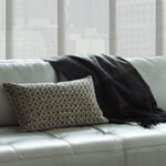 A pillow and a casual throw add the perfect touch of black.