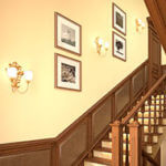 Photographs can be arranged diagonally along a stairway.