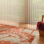 A rug with an abstract pattern adds energy to a room.