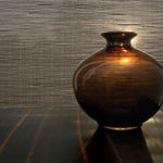 This beautiful copper vase adds a lustrous glow to the room.