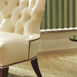 Decorative metal edging on this chair creates an elegant look.