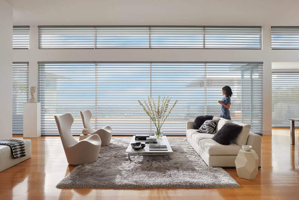 Silhouette® shadings feature soft adjustable fabric vanes that appear to be floating between two sheer fabric panels that beautifully diffuse harsh sunlight. Simply tilt the vanes to achieve your desired level of light and privacy.
