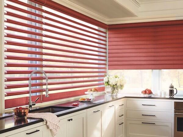 Red Pirouette® window shadings energize this kitchen.