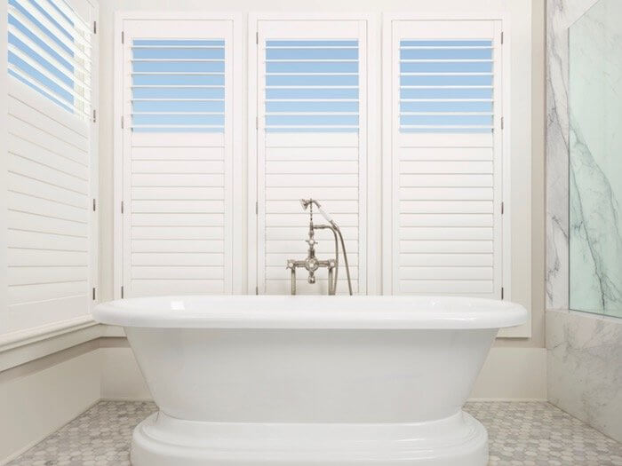 Mixing surfaces adds interest. Shown with Palm Beach™ shutters.