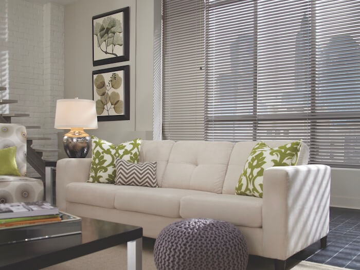 If you prefer neutrals, just add a couple of lime green pillows. Shown with Natural Elements™ aluminum blinds.