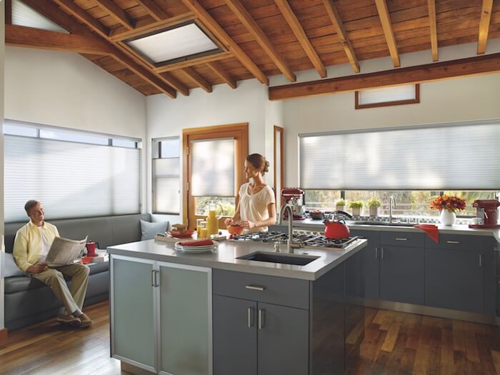 A built-in bench completes this kitchen. Shown with Applause® honeycomb shades.
