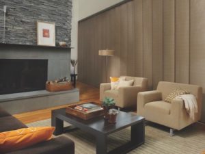 Mix and match fireplace materials to add interest. Shown with Skyline® Gliding Window Panels.