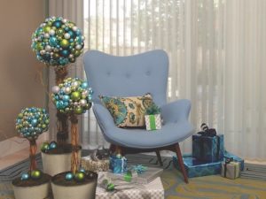 Select a consistent color scheme for your holiday look. Shown with Luminette® Privacy Sheers.
