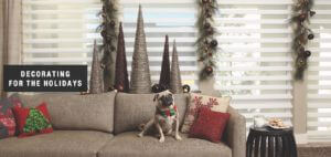 Holiday-themed pillows are an easy way to decorate your home for the season. Shown with Pirouette® window shadings.