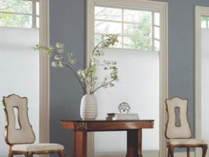 white vase flowers formal room chairs