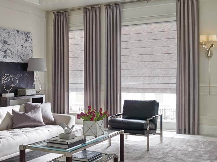 Design Studio™ Side Panels & Drapery Fabric: Hudson in Steel, and Design Studio™ Roman Shades Fabric: Celia in Fairy Wings