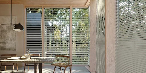 Aluminum window blinds on large windows in New England